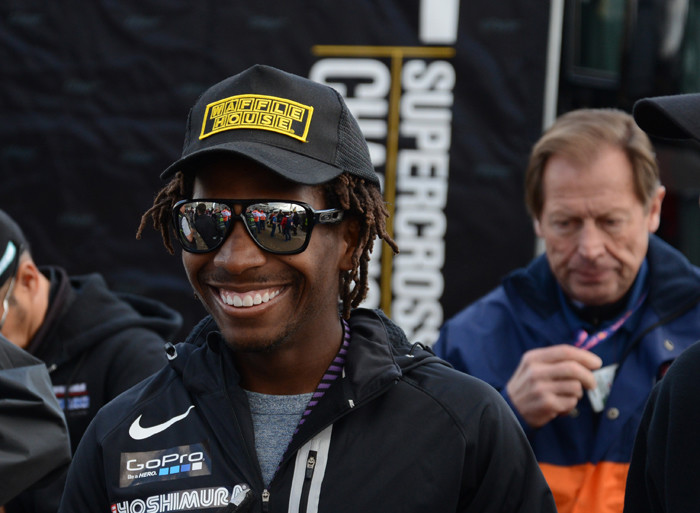 James Stewart is all smiles as the night gets ready to roll. Stewart is among the most gifted to ever throw a leg over a bike and has several titles to his credit, but the wins aren't coming as easy as they once did...blame it on the parity. Yeah, that's the original 'Over-being' in the background, which is increasingly where James is finding himself this year.