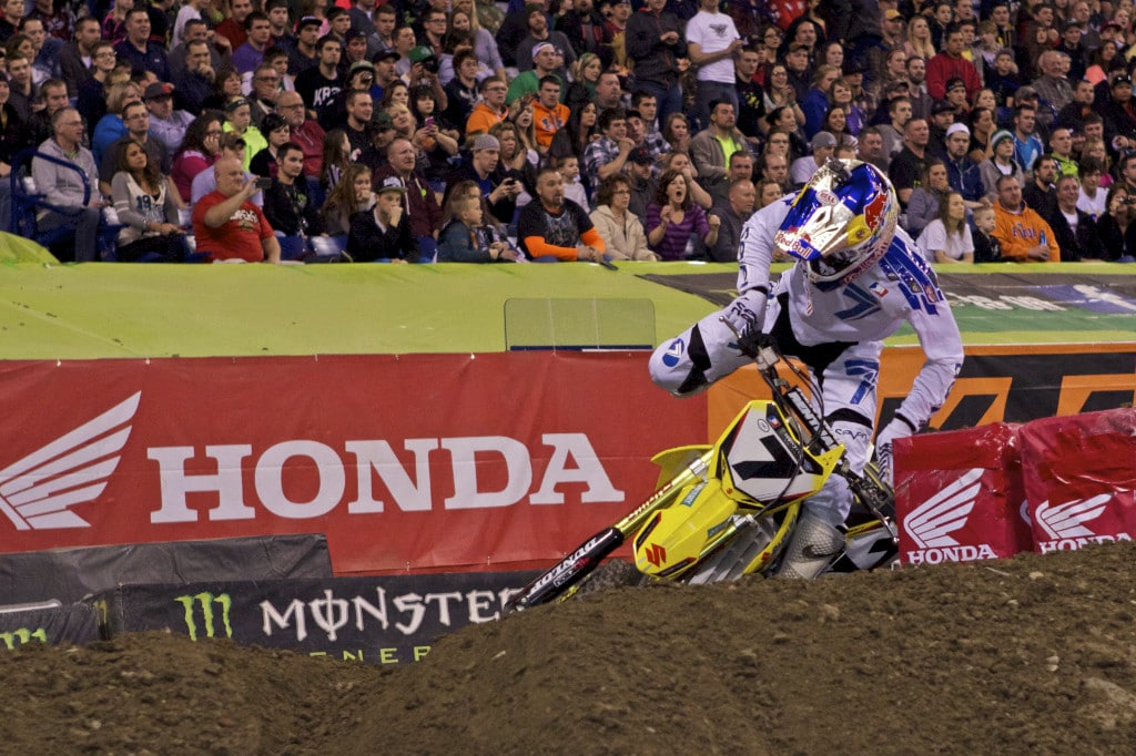 After a great start and the beginnings of a strong lead over Villopoto, Millsaps and Dungey, a minor mistake caused Stewart to both stumble and stall his bike within the off-camber turn after the whoops.