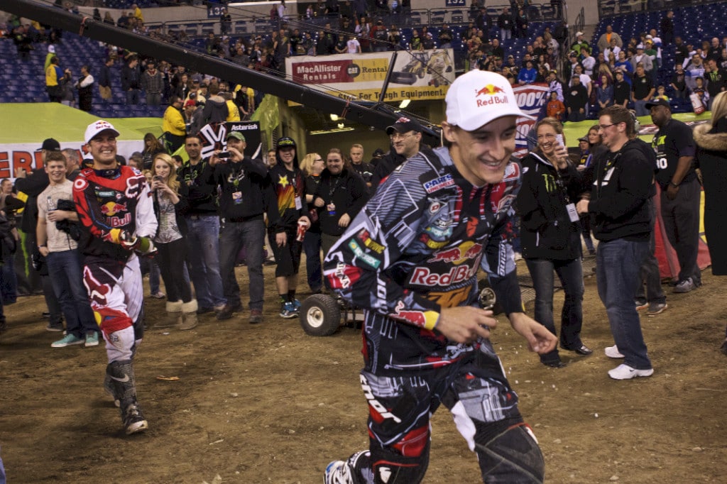 Sometimes knowing a rider is a good thing, but I have to learn how to take my queues a little quicker next time. With a quick wink from Ryan Dungey, I was too late to react to what happened next as Champagne was soon spraying onto Marvin Musquin who was standing directly next to me when the spirits started flying. Not long after, Ryan Villopoto got involved also spraying the young Red Bull KTM rider down as well. Gotta love Supercross hazing rituals!